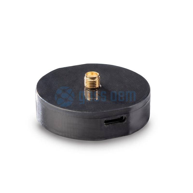 ZED-F9P GNSS smart antenna with USB C, SMA helix antenna in the IP54 BLACK plastic case.